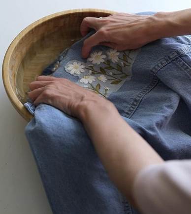 Hand embroidery in Denim